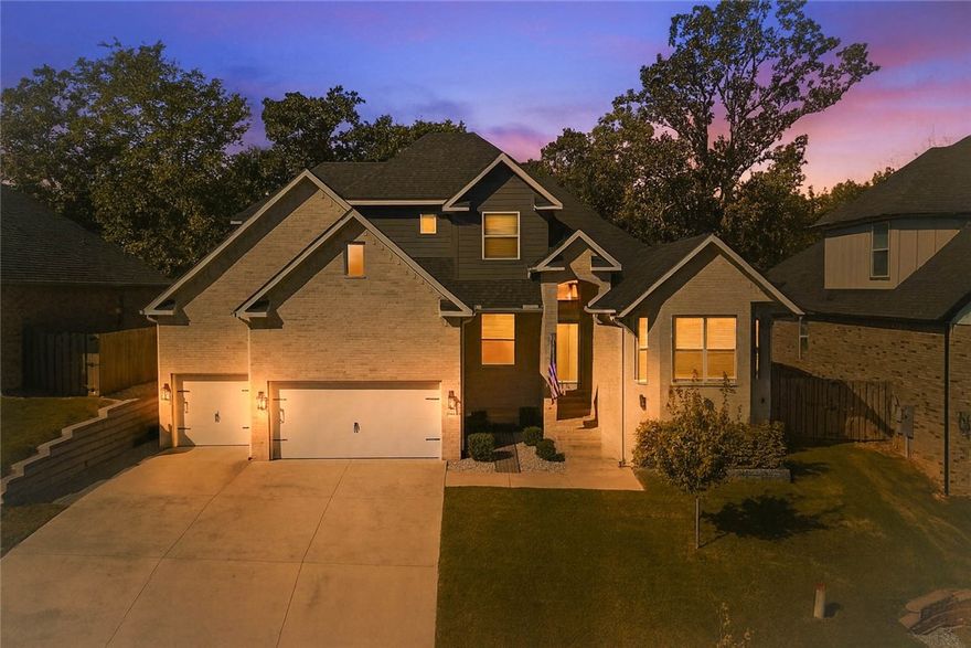 If you value the care a home receives, you'll love this 5 bedroom beauty! Like a fine wine, this home has improved with age thanks to the sellers relentless pursuit of precision & efficiency. Inside & out, you'll find quality custom details & upgrades everywhere you look! From custom built drawers, organizers & shelving, to breathable radiant barriers & attic foils, to a fully insulated 26' deep garage/workshop with mini-split, 14' ceilings, shop lights, & belt drive garage door openers; you’ll quickly find this home outshines the competition. Additional features include soft-close cabinets, a whole house water filtration system with recirculating pump, a storm shelter, upgraded lighting & fans, a screened in patio with natural gas hookup, and french drains in the landscape. 
All this in a location that makes everything in NWA easily accessible while preserving your personal retreat in a small neighborhood complete with its own private pool & clubhouse. Schedule your private showing of this amazing home today!