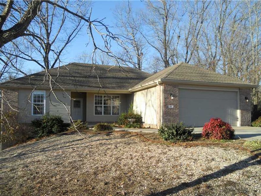 Low maintenance home, with gorgeous views from your screened-in deck.  Adjoining covered deck area for outdoor grilling & entertaining with direct master bedroom access.  Fenced side yard is an idea play area for small children or dog.   Open split plan,creates a very livable space for entertaining or family functions.  All new paint, ceramic tile floors in kitchen, nook, bathrooms & laundry room, laminate wood floors in living & dining rooms.  Brand new plush carpeting in bedrooms, move-in ready!