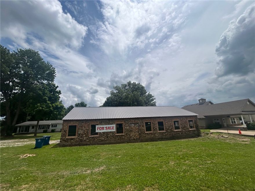 nvestment opportunity in the heart of rapidly growing Gravette! Located at 1002 1st Ave SE, this 0.69 +/- acre property offers approximately 155 feet of highly visible Highway 59 frontage with outstanding exposure and future potential. Currently zoned residential, this property presents an excellent opportunity for possible commercial use development with high traffic visibility and a prime location directly across from the revenue office and Subway.



The existing home will require major repairs, making this an ideal option for investors, developers, or entrepreneurs looking to capitalize on the location and frontage. A shop building on the property already features newer roof and windows. Whether you are looking for a redevelopment opportunity, future business location, or investment property, this tract offers incredible potential in one of Gravette’s busiest corridors