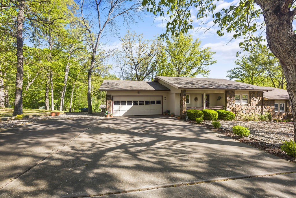 Rare hard to find, one level, includes sunroom, oversized two-car garage with storage room, immaculate condition, in an ideal location, friendly, well-maintained neighborhood, within walking distance to Riordan Rec Center, country club & golf Course, and move-in ready. The remolded kitchen includes Granite countertops, backsplash, & appliances. Replaced windows, roof, walk-in shower, water & sewer lines, gorgeous hickory wood flooring, exterior & interior recently painted. This home amends lots of storage with a pantry, a large linen closet, a storage room, basement storage, and an oversized driveway. This townhouse property is spacious & reflects a single-family home-type setting. Expect a lot of interest in this property. Advise seeing this property ASAP.