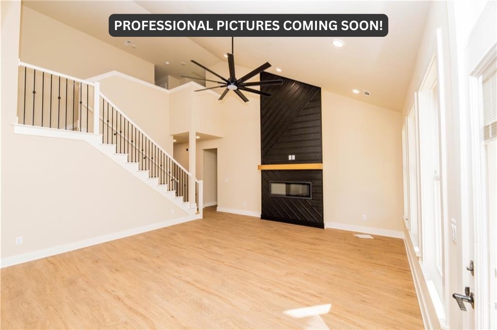 Find your dream home in one of NWA’s most exciting new communities—Paradise Park! Nestled between Bentonville Schools, Gamble Elementary, Bentonville West High, Kinyon Sports Complex, the future Centerton Community Center, and just minutes from the interstate, this home has so much to offer. This beautiful East-facing home features modern design and everyday luxuries. Step inside to an elegant foyer, unique finishes, and luxury vinyl flooring throughout the main level. A sleek fireplace wall with beautiful millwork adds a bold focal point. The gourmet kitchen features custom cabinetry, quartz counters, a spacious pantry, and energy star appliances. Spa-like baths boast floor-to-ceiling tiled showers, designer lighting, and a soft neutral palette. The smart layout includes a main-level primary and guest suite, with two bedrooms, a full bath, and a theater/game room upstairs. Covered patio with gas hookup and fenced yard complete the package. Welcome home!