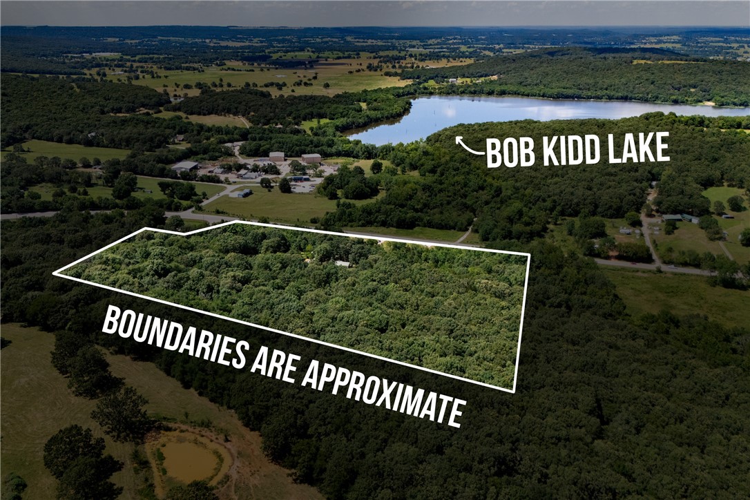 Motivated sellers! Welcome to nearly 20 acres of beautiful, usable land along Highway 62 in Prairie Grove. This unique property offers the perfect blend of privacy, functionality, and outdoor appeal—whether you’re dreaming of a country homestead, a hobby farm, or an investment opportunity. You’ll find a mix of cleared level areas, gently rolling pasture, mature trees, and established trails ready to explore. Located just minutes from Bob Kidd Lake, this spot is ideal for fishing, kayaking, or relaxing by the water. Recent upgrades include new windows and HVAC (2021), plus all appliances will convey with the sale (please include in offer). A detached shed/shop provides added storage or workspace. With space to roam and endless potential, this land is ready for whatever vision you bring to life.