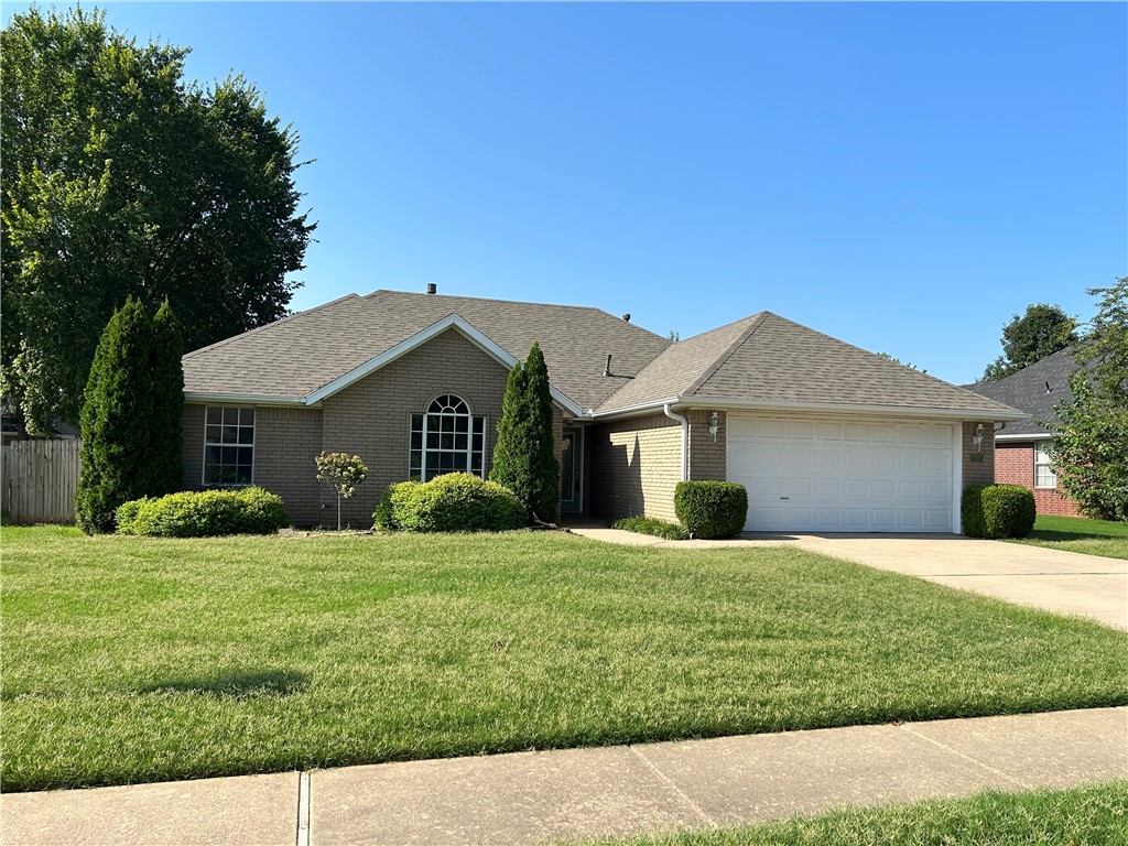 Ideal location for enjoying all the amenities of NW Arkansas. Located just minutes to I-49, Don Tyson Parkway, and close to the new Johnson developments, NW AR Mall, Razorback Greenway trails. Well maintained 4 bedroom home with many recent updates. New roof shingles in 2022, water heater 2020, HVAC 2018, stove 2021 and new garbage disposal. Split floorplan, attractive breakfast area, lots of storage and built-ins. The gas fireplace has a thermostat. Large pantry. Workbench and shelving in garage, plus more in the storage building. Covered patio with ceiling fan, and pretty fenced yard with trees and shrubs.