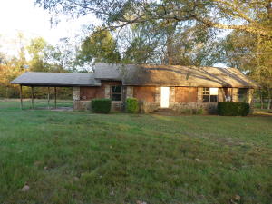 3 BD/2BA rustic style home on .83 acres. Enjoy life outside of town. Large living room. Extra room off living room would make a good office. Would make a good flip or fixer upper.
