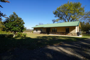 Do It Your Way....Decorate to your heart's content in this 3-bedroom/2-bath ranch home on .94 acres. This home boasts a casual living room with carpeting, conventional kitchen with laminate countertops that has an additional breakfast bar. To top it off, enjoy the extra room that can be used in so many ways! Step outside to the spacious yard and wonderful sized shop as well.