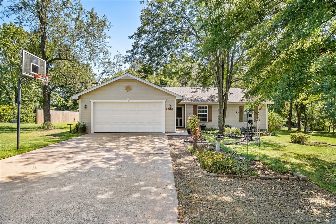 Prime investment opportunity in Bentonville's Business District. Near trails. .9 miles from Horsebarn Trailhead. 2.7 miles to Osage Creek Trail. 2.5 miles to Rail Line Trailhead North. 2 Miles to the new Walmart campus. Walking and biking distance to other nearby businesses. Existing home features a large backyard oasis including an above ground pool and mature trees with plenty of shade. Or purchase up to 3 acres by combining several surrounding lots and development opportunities are endless! High density residential zoning available. See attachments for regional zoning policy. Also listed as Commercial MLS # 1297380