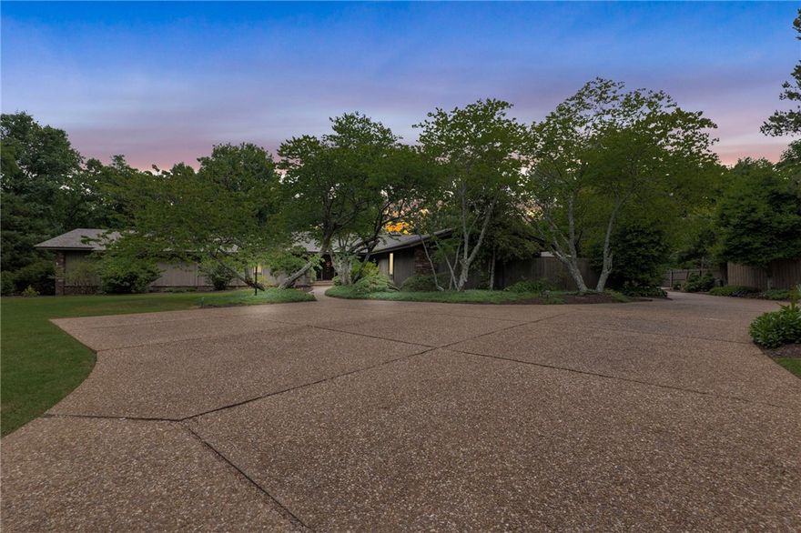 This stunning one-owner home sits on an expansive 2.53-acre, offering plenty of space and privacy. Designed by renowned architect Albert Green, this mid-century modern gem boasts 4 bedrooms, 3.5 bathrooms, including a 2nd primary bedroom.As you enter the home, you'll be greeted by an open floor plan that's filled with natural light. The main living area features soaring ceilings, floor to ceiling windows, rock fireplace, sleek lines, and a minimalist aesthetic that's both stylish and functional.The primary suite is a true oasis, complete with a spa-like bathroom, which also features a sauna. Outside, the property is equally impressive, with lush landscaping, mature trees, and a large deck area. And when you're ready to cool off, you can simply walk across the street to the neighborhood pool and tennis court. Extra room in the garage for storage/workshop.This is the first time this home has ever been on the market, so don't miss your chance to own a piece of architectural history in a highly sought-after location.