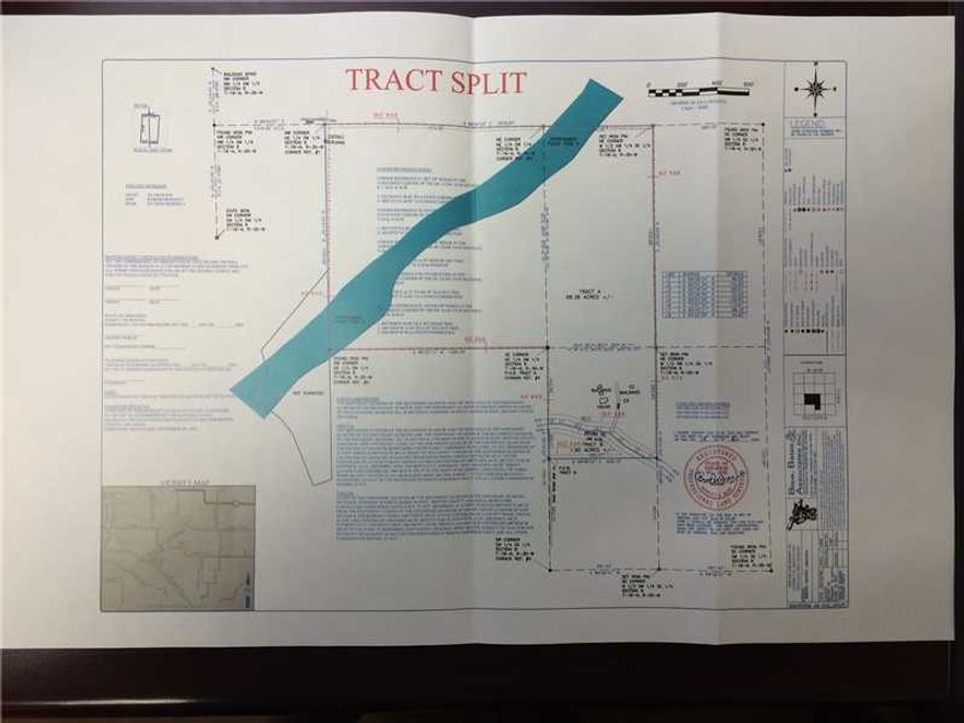 Great development potential, beautiful rolling land, mostly cleared with various trees, flowing creek lined with trees.