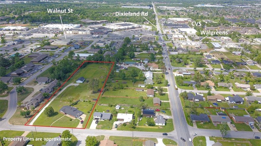 Incredible investment potential in the heart of Rogers. 3.19+/- acres of flat land with endless development opportunities. Currently zoned T3.1, but per city of Rogers could be zoned to T4.1 or T4.2 allowing for higher density development such as apartments, townhouses or condos. Property consists of 2164 SF home with new roof last fall, new A/C and heater, 2200 SF metal shop and 2 storage sheds, 20x10 and 12x10. Don't miss this rare development opportunity in the heart of Rogers.