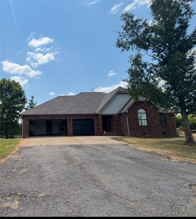 This breathtaking country estate is the perfect blend of luxury and natural beauty. The stunning centerpiece is without question a 2.5 acre pond locally famous for its fishing and your own personal dock just steps from the back deck. Enjoy your morning coffee from the sunroom overlooking the pond all with a complete remodel in 2022. The pictures will speak for themselves! The inside has far too much to mention, a true MUST SEE. All of this less than 1.5 miles to the Scottsville bridge known for putting in or taking out your boat while canoeing/kayaking the Illinois Bayou.