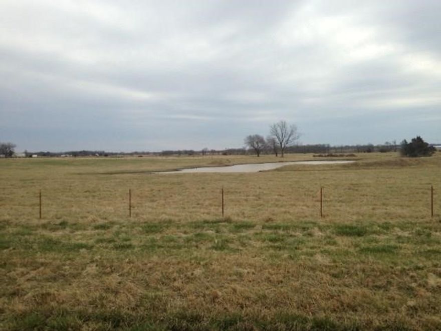 Great property - development potential - fronts Hwy 59. Property has a good well, public water at street, electric on site and natural gas.