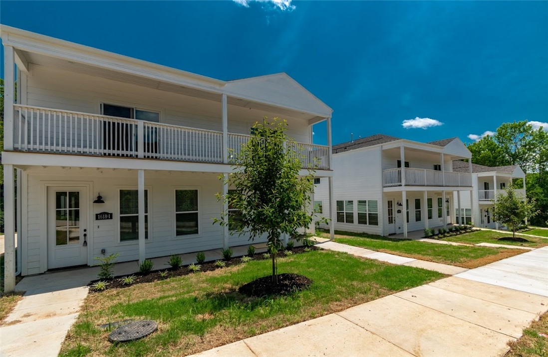 Incredible investment opportunity in amazing location! Walking distance to Baum-Walker Stadium (Razorback Baseball), trails, and more! Only minutes to University of Arkansas, shopping, dining, mountain biking, parks, I-49, Fayetteville Square, Farmers Market, and so much more! Property includes 3 brand new luxury duplexes for a total of 6 units! Each unit is 3 bedroom, 3 full bath, 1 half bath, and 1757 square feet. All units are leased through July 31st of 2026 with tenant paying all utilities! Total Gross income is $210,000.00 per year. Finishes include premium quartz counter tops, hardwood floors, high end gas range, luxury trim package, custom built cabinets to ceiling, stainless steel appliances (including refrigerator), washer, dryer, cozy front porch, covered balcony, and more! All bedrooms are upstairs with their own bathroom! Kitchen, Living room, dining room, and half bath on main level. Perfect for a 1031 exchange!