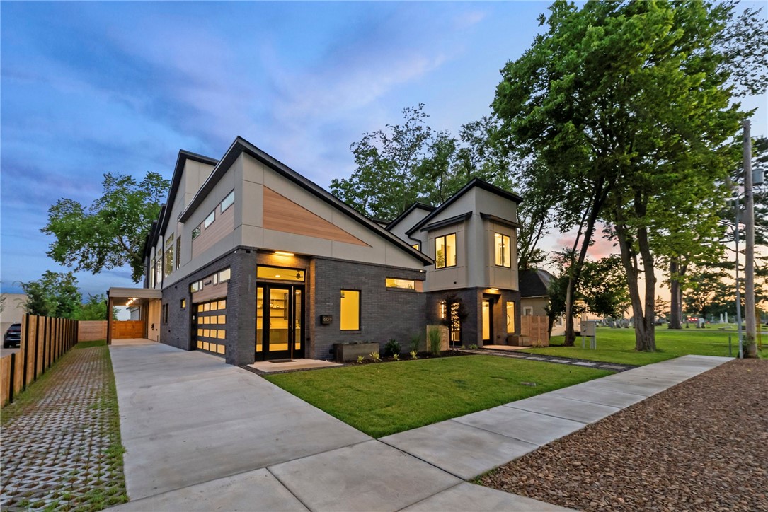 Preferred lender offering up to 1% of the loan amount in credits for qualified buyers! Welcome to a rare opportunity to own a custom luxury home in the heart of Downtown Bentonvilleāperfectly designed for multi-generational living or income-producing potential.
The main residence features 6 spacious bedrooms, 4 full bathrooms, 2 half bathrooms, and 3 separate laundry areas, offering flexibility and function for large families or shared living arrangements. An attached apartment with its own private entrance creates the perfect setup for guests, extended family, or short-term rental income.
The detached guest house is a fully equipped standalone home with its own living room, kitchen, laundry area, 2 bedrooms, and 2 bathrooms.
Curated from top to bottom, with white oak wood flooring, quartz countertops, and a matching quartz backsplash for a modern aesthetic. Itās pre-wired for security cameras and in-ceiling speakers, and includes 2 EV chargers.