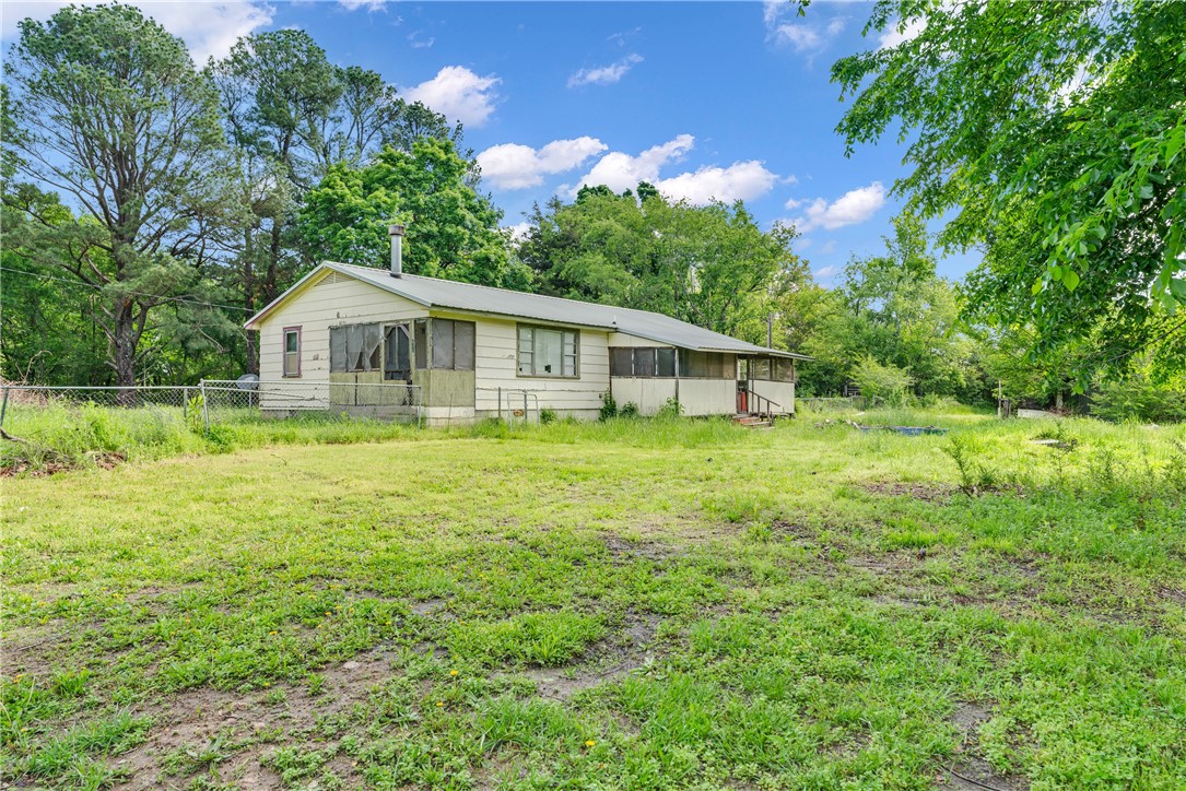 Great opportunity for first-time buyers or investors to bring their vision to life in a highly convenient Fayetteville location. Just minutes from shopping, dining, schools, and major roadways, this home sits in a growing area with strong potential. The layout offers a functional foundation, and while updates are needed, there's plenty of room to add personal touches or renovate for future value. The property includes multiple outbuildings: a large all-metal pole barn that can be fully opened to accommodate up to three vehicles, a 3-sided metal shed, and a detached office with a metal roof and electricityāoffering great flexibility for storage, workspace, or hobby use. The spacious backyard provides outdoor potential for entertaining, gardening, or expansion. The property is also equipped with a 1,000-gallon septic system featuring five leach lines totaling 700 feet, designed for efficient and reliable use. Whether you're looking for a starter home or your next project, this one is worth a look.