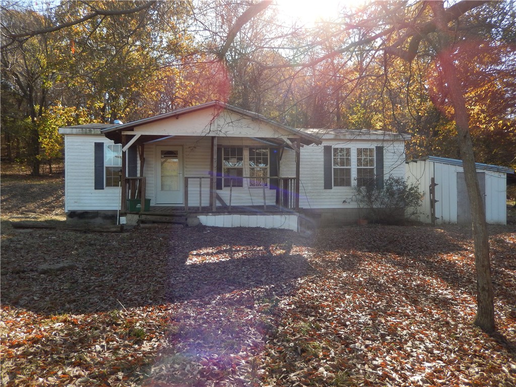 Mobile home on 2.5 Acres! Nice peaceful setting! Must drive down long drive, it will be 2nd mobile. HomeSteps property. Seller will not complete any repairs to the subject property, either lender or buyer requested. The property is sold in AS IS condition.