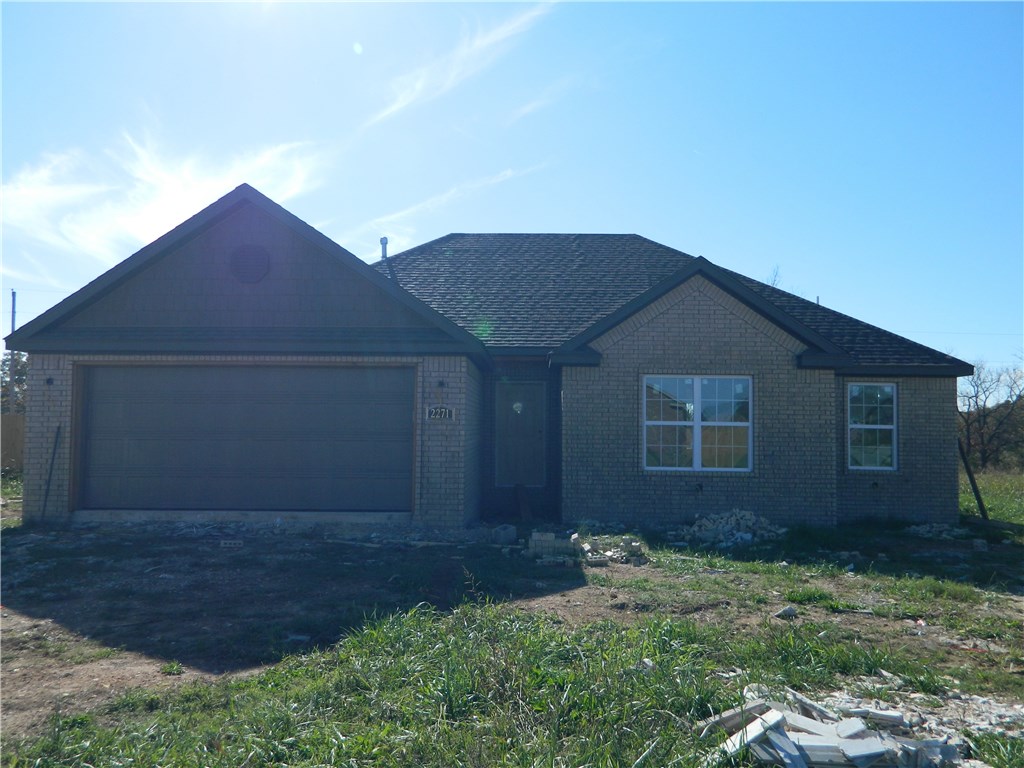 SELLER WILL PAY UP TO $2,000 TOWARDS BUYER'S CLOSING COSTS! RD ELIGIBLE! WELL BUILT 3BD/2BA NEW CONSTRUCTION HOME! Desirable features include split floor plan, wood tile in living room, kitchen, hallway and entry, carpet in bedrooms, granite, 2" faux wood blinds, custom cabinets, pantry, fireplace, 2 walk-in closets in master bath, and covered patio.