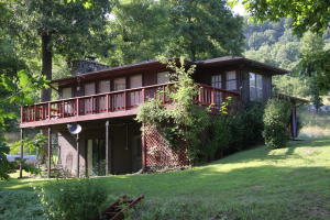 VA APPROVED-Nice 3BR/2BA home on 40 ac. Private & secluded area. Upstairs has floor & attic storage. Plus 1BR/1BA guest house separate from house on same lot. 3 stall horse barn & goat barn w/electric, 3 ponds (1 by horse barn, 1 by goat barn & 1 with fish by the house), 20x28 workshop, in-ground pool. Great hunting, plenty of wildlife. Quick close & possession.