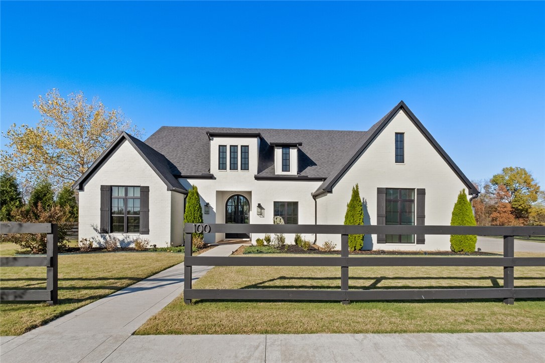 Welcome to this stunning 3,998 sq. ft. single-story home in Bentonville, Arkansas, where modern design meets convenience. Situated on a fully-fenced, landscaped 1.01-acre lot, it offers privacy, space for gardening, and easy access to shopping, entertainment, the Bentonville Community Center, top schools, and downtown.
Inside, the open floor plan features elegant hardwood floors and a chefās kitchen with GE CafĆ© appliances, a hidden pantry with wine fridges, and abundant countertop space. Accordion doors lead to a spacious patio, perfect for entertaining. The living area centers around a dual wood/gas fireplace for cozy evenings.
Additional features include a three-car garage with a Tesla charger, a tornado shelter, fully-owned solar panels, and smart home technology. With R48 insulation, a three-zone HVAC, and waterless hot water heater, this home combines comfort, efficiency, and style. Donāt miss this exceptional Bentonville property! No sign in yard.