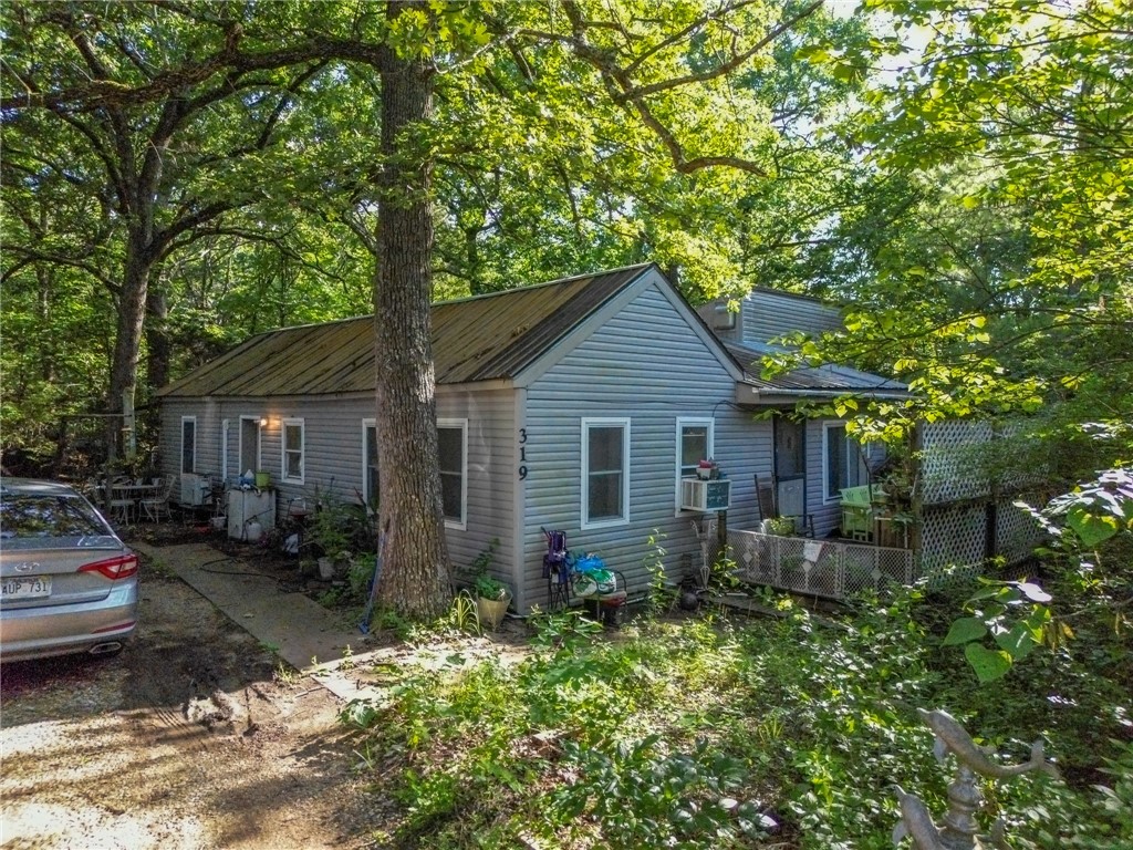 This one's all about the income potential. With an annual rental revenue from seven unitsāfive older
trailers and two homesāthis property is already performing. The current owner occupies this home, with a
family member in another, but both could be added to the rental pool. These structures are in rough shape
and likely won't qualify for traditional financing, but for the right buyer, there's real upside here. Whether
you're looking for cash flow, land value, or future redevelopment, the numbers tell the story.