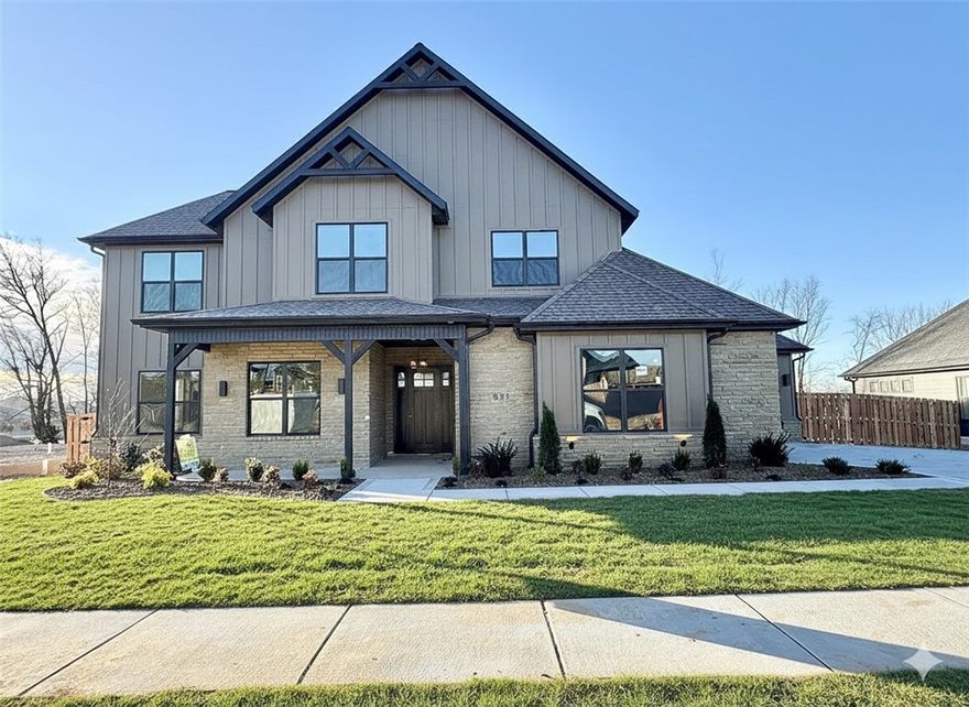 Located in sought-after neighborhood of Big Sky this masterpiece of design & luxury, is a testament to impeccable taste. The heart of this haven is undoubtedly the chef's kitchen, sprawling island, vegetable sink, 5-burner/double oven gas range, quartz counters, walk in pantry, and custom stain. Living room centers around stunning tile gas fireplace, enveloped by oversized windows that bathe the space in natural light. Adjacent, the dedicated dining area with painted accents is positioned for a seamless flow. Retreat to the primary suite, where oversized windows invite in sunlight & spa-inspired bath with a walk-in tile shower featuring double showerheads, soaking tub, double sinks & walk-in closet and direct access to the laundry room. Study with French doors and stunning accent wall and secondary bedrooom on the main level. Upstairs reveals a generous bonus room with a wet bar and two secondary bedrooms. Enjoy the oversized covered patio overlooking the fenced backyard. $3,000 if you use the preferred Lenders