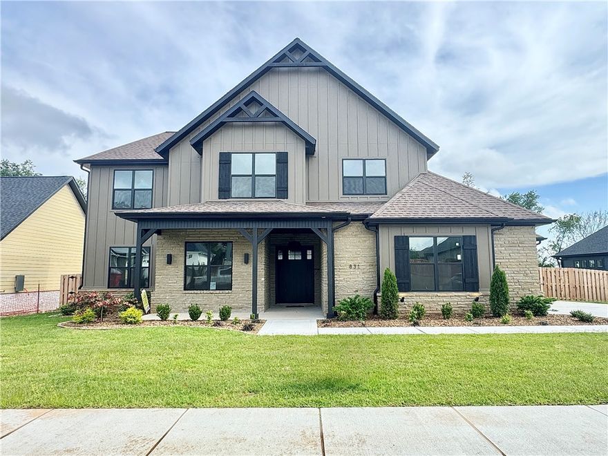 Located in sought-after neighborhood of Big Sky this masterpiece of design & luxury, is a testament to impeccable taste. The heart of this haven is undoubtedly the chef's kitchen, sprawling island, vegetable sink, 5-burner/double oven gas range, quartz counters, walk in pantry, and custom stain. Living room centers around stunning tile gas fireplace, enveloped by oversized windows that bathe the space in natural light. Adjacent, the dedicated dining area with painted accents is positioned for a seamless flow. Retreat to the primary suite, where oversized windows invite in sunlight & spa-inspired bath with a walk-in tile shower featuring double showerheads, soaking tub, double sinks & walk-in closet and direct access to the laundry room. Study with French doors and stunning accent wall and secondary bedrooom on the main level. Upstairs reveals a generous bonus room with a wet bar and two secondary bedrooms. Enjoy the oversized covered patio overlooking the fenced backyard. $3,000 if you use the preferred Lenders