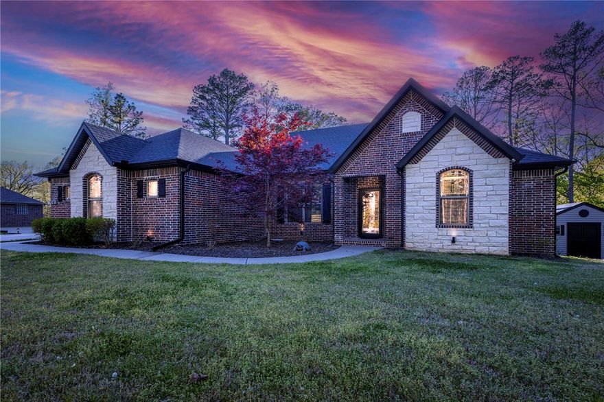 Nestled in a nature lover, hiker, or mountain biker's paradise, this property is just under 1.25 acres (4 connected lots) with 2417 square feet of well-maintained one level living space. Perfectly situated just one mile off 71 and steps away from the Buckingham Trailhead of the Back 40 - offering both convenience and privacy. Just minutes away from Metfield Recreational Complex. The quarter circle level driveway leads to an oversized two-car garage and separate single car garage. Inside you'll find an open living area with 10 ft ceilings, crown molding, guest bathroom, granite counters, a large single sink in the kitchen, laundry room off the master closet with a folding area, split floor plan with bathroom between the 2nd and 3rd bedrooms, plus an office or 4th bedroom (home has a 4 bedroom septic). Relax on your large private covered porch overlooking the woods or entertain on your 1/3rd of an acre sodded side yard which is perfect for outdoor games. Home also has a custom built 12x12 shed for plenty of storage.
