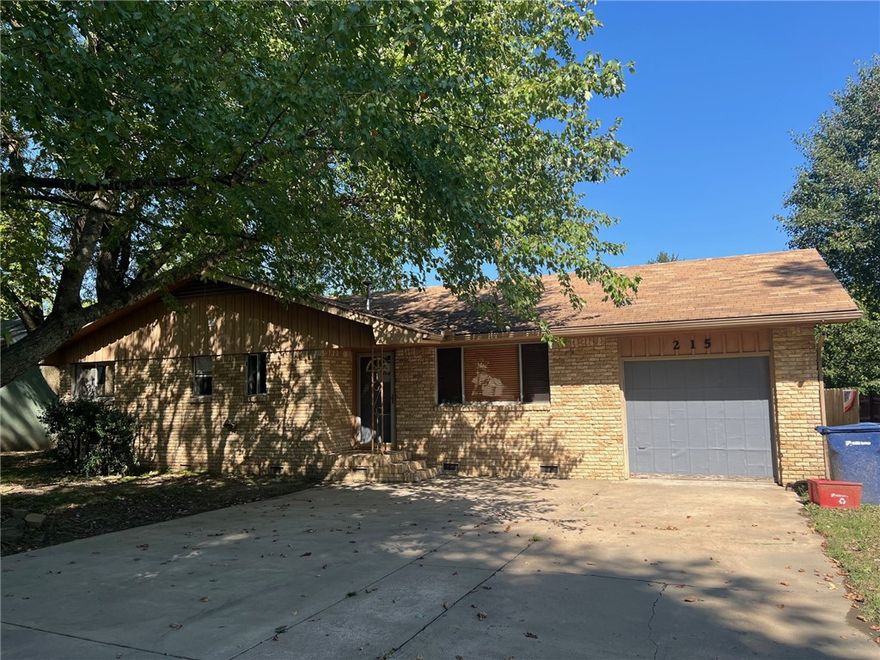 Refrigerator, Full size washer/dryer included and Storage Building! Located in a nice established neighborhood. All brick, three bedroom, 1 3/4 bath home. Extra concrete widened front driveway for extra parking. Hall bath & Kitchen has been updated. New paint and flooring throughout. Attic fan. Covered patio with large backyard. Carport in backyard for RV or Boat Covered Storage plus a storage building. For application:  https://apply.link/AvAMm1M.