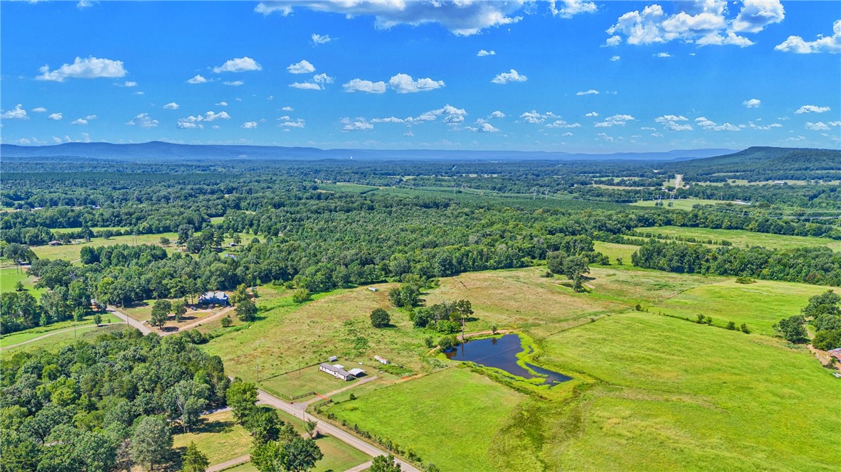 Come view this 62.55 stunning acres, where nature meets endless possibilities! This property boasts a mobile home 3 bed 2 full bath 1,050, multiple ponds, all gracefully nestled next to the serene Chickalah Creek. Imagine the lifestyle you could create hereāwhether itās crafting your dream home amidst open pastureland, a hobby farm, or raising livestock. With views of Mount Nebo and Spring Lake Mountain, this land is a canvas for your imagination, offering a perfect blend of space, privacy, and natural beauty. Donāt miss this rare opportunity to own a piece of paradiseāwhere the only limit is your creativity! What dream are you ready to cultivate here?