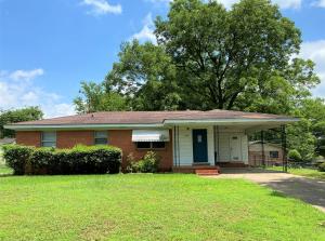 Fresh paint and cool 60's details make this charmer one of a kind. It's a perfect starter home or investment property! Large fenced back yard makes this location ideal for families and/or pets. Generous sized storage building allows for extra storage.