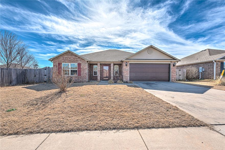 This beautifully maintained 4 bedroom, 2 bath home in Lowell features a desirable split floor plan and stylish upgrades throughout. Enjoy LVP flooring, granite countertops, and a spacious kitchen ideal for everyday living and entertaining. Step outside to a large back patio overlooking a fully fenced backyard with peaceful pond views and direct access to a walking and biking trail through your private back gate. The sunken firepit seating area creates the perfect space to relax or host gatherings, and the outdoor storage building offers excellent space for a workshop or extra storage. Conveniently located near I-49 with quick access to Fayetteville, Rogers, and Bentonville, this move-in ready home combines comfort, privacy, and unbeatable Northwest Arkansas convenience.