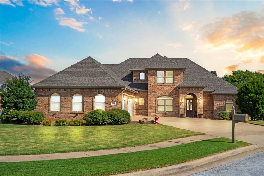 Live in the heart of Rogers with the perfect balance of convenience and outdoor lifestyle. This rare 5-bedroom, 3.5-bath all-brick home backs directly to the Greenway, giving you instant access to miles of biking, running, and walking trails while keeping you just minutes from shopping, dining, the Promenade, and the Walmart Amp. Inside, wood floors flow through an open kitchen and living area with granite countertops, an eat-in space, and a formal dining room. Every bedroom has its own walk-in closet, and the primary suite offers a whirlpool tub and a large walk-in shower for relaxing at home. A fenced backyard with deck and patio makes entertaining easy. Located within walking distance to Bellview Elementary School, this home blends access, activity, and everyday comfort in a prime Rogers location.