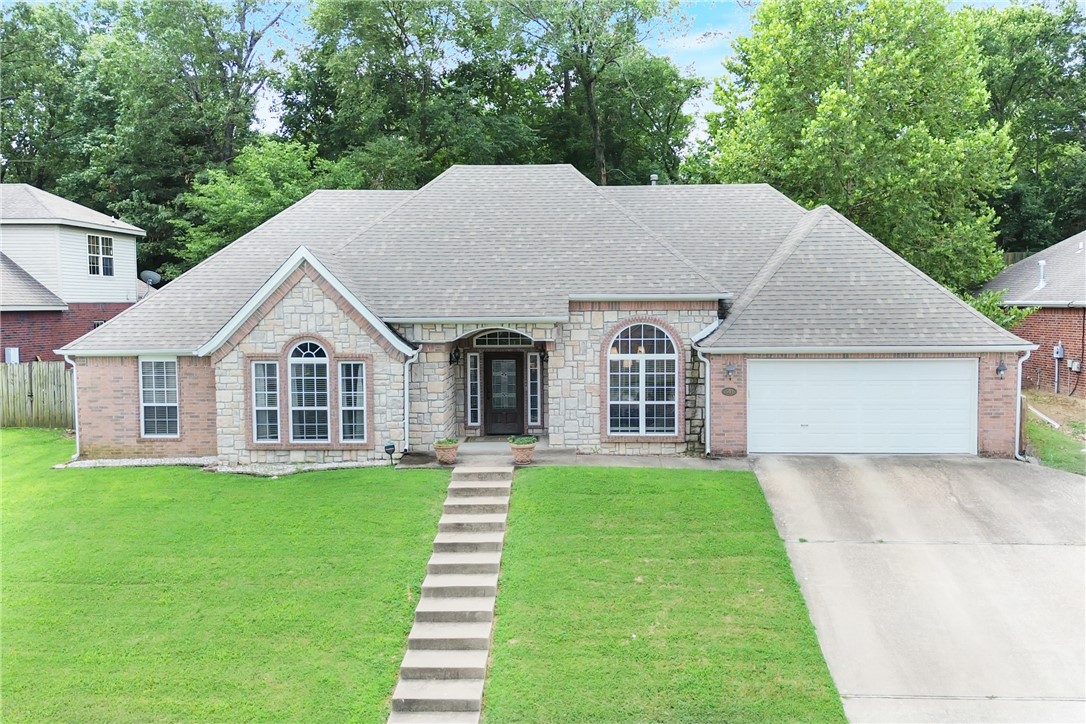 Welcome home to this beautiful single level 4 bedroom 2.5 bath gem perfectly located near the best of NWA living. Enjoy direct access to walking and biking trails, the Arkansas Greenway and the vibrant Lake Fayetteville food truck court. Whether your enjoying the lake, trails, shopping or the schools everything is just minutes away. Inside you will find, not only a functional layout a with large living room and dining area but a second living room open to the kitchen with a gas log fireplace. Talk about a homey home. The modern design is aesthetically pleasing and well thoughtout. This home is also wired with 2.5 gigabit highspeed internet- perfect for working from home, streaming and staying connected. Don't miss this incredible home in one of the most sought after locations in Springdale. These properties dont come up often so schedule your appointment today. Water heater replaced 2019, roof 2020, AC 2022 and dishwasher 2025.