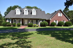 This amazing custom home is just up the hill from the Russellville Country Club!!! It has been owned by one family since it was built. With 3 bedrooms and 3.5 bathrooms as well as 2 completely finished bonus rooms upstairs there is ample room for living. The master bedroom is huge and has 2 bathrooms. The kitchen and dining area are all open and coupled with the beautiful back deck make this home great for entertaining. When you visit this home you will know that it was built with quality in mind.