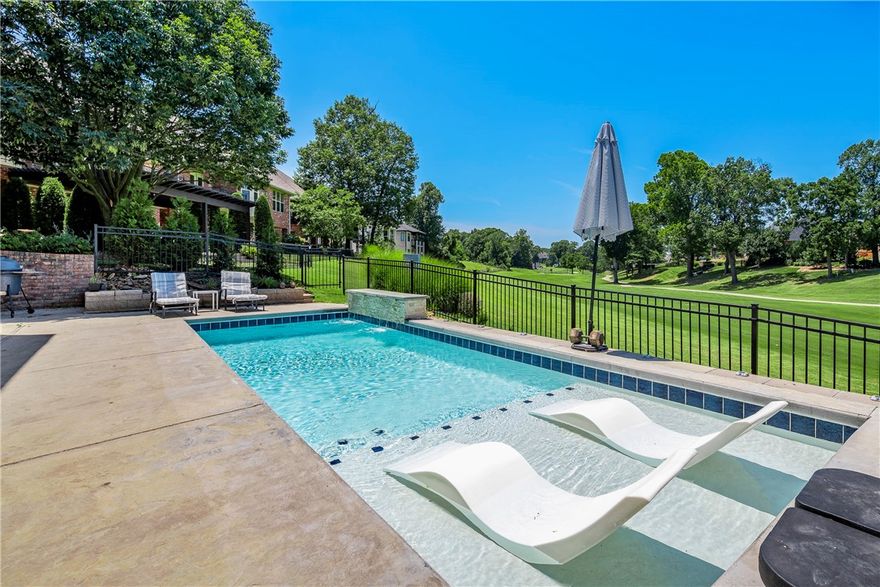 Experience peaceful, carefree living in this beautifully appointed, better-than-new 4-bedroom, 3 full, 1 half bath find nestled in Shadow Valley. Wake up to tranquility in this light, bright, high-quality, custom-built home! Featuring a spacious family room w/fireplace, laundry w/sink, office, formal dining, den, bonus room/gym, walk-in storage/safe-room, oversized 3-car garage, & large bedrooms each connected to a bathroom. Exquisite finish work includes crown molding, beautiful cabinetry, & custom built-ins. The full-featured kitchen boasts stainless steel appliances, quartz counters, over-counter lighting, vented gas range, walk-in pantry, & spacious island/breakfast bar. The roomy master suite w/large bathroom boasts dual vanities, soaker tub, walk-in shower, & spacious walk-in closet! Nestled golf front & among the trees, relax on your patio or composite deck & take in the lush yard that features a heated salt-water pool with water feature, or head to the clubhouse & enjoy one of the many community amenities.