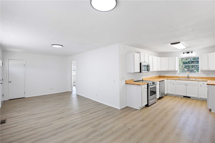 Welcome to this adorable 3-bed, 1-bath home, tucked away for peaceful living while still being minutes from the main road for easy access. This home has been completely renovated from top to bottom, offering the perfect blend of modern updates and cozy country charm.
Step inside to find brand-new flooring throughout, including plush carpet and luxury vinyl plank wood for a warm, inviting feel. Fresh paint and new flush ceiling lights brighten every room, creating a clean and welcoming atmosphere.
The quaint kitchen is a true highlight — featuring new appliances, butcher block countertops, and charming touches that make it feel like home the moment you walk in.
Enjoy a large yard surrounded by mature trees, offering privacy and plenty of space for outdoor living, gardening, or entertaining. 
This move-in ready home has everything you need. Don’t miss your chance to own this cozy countryside retreat!