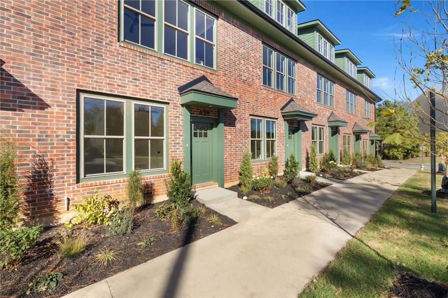 The Brookline Townhomes are here! These beautifully designed new townhomes join traditional architecture with modern construction, stylish finishes, and contemporary amenities. Each unit features a private one-car garage equipped with a 220V outlet for EV charging. Just inside, a heated and cooled flex space offers the perfect spot for a home office or creative studio. An open-concept kitchen and living area is filled with natural light, with a convenient half bath nearby. The spacious bedroom suite includes a built-in desk nook, oversized walk-in closet, and sleek full bath with walk-in shower. These townhomes are built to be highly energy efficient: perfect for those seeking a low-maintenance lifestyle and convenience. Located just minutes from the University of Arkansas and the Arts & Entertainment District, these homes provide close proximity to Fayetteville’s best attractions. See today why the Brookline Townhomes offer a unique opportunity for private, connected living in a vibrant community.