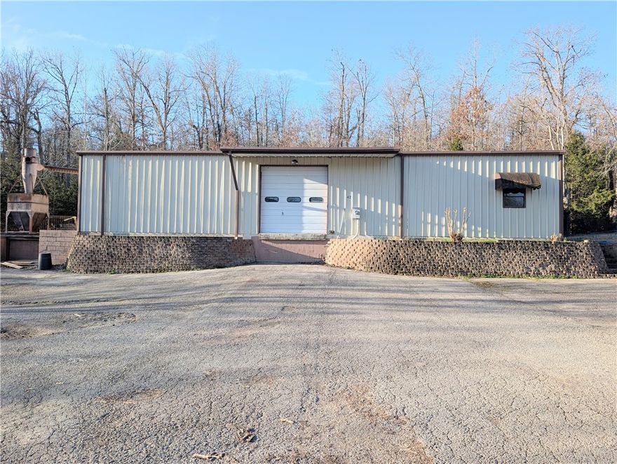 Excellent commercial warehouse offering 3,600 sq ft of usable space on 4 acres, located approximately 230 feet from Highway 5 South with 450 feet of highway frontage for maximum business exposure. Built in 1992, this property features durable red iron steel and concrete construction with a paved entrance, parking & metal exterior. The building includes two large bay doors for convenient equipment access, a dedicated office space, and an open floor plan that can easily accommodate a variety of business operations, including contractors, service companies, storage, light manufacturing, or distribution.
The property is served by a shared well and offers ample space for parking, equipment storage, or future expansion. Just minutes from Mountain Home, this location combines visibility, accessibility, and acreage—priced to move and ready for your business.