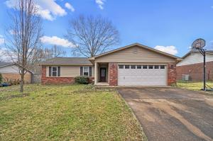 Great home with lots of extras! This home is in move-in condition with lots of open living space. Wide open living area with fireplace connects to kitchen and eat-in dining. Tile and laminate throughout, patio out back as well. New siding and windows are a plus and it is close to everything in Russellville. If you have been looking for a nice home less than 130K this is it.