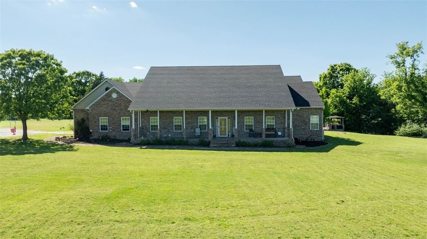 Welcome to your slice of country paradise—just minutes from downtown Prairie Grove! Enjoy peaceful living on spacious land with all the comforts of home. The generous layout features a fully equipped kitchen with granite island, double ovens, full-size fridge, and ample storage. A large bonus room offers space for a home theater, office, or studio. Major recent upgrades include: new five-ton HVAC, water filtration system, new pool liner, new pool deck, new roof. Step outside to your private oasis with a sparkling pool perfect for summer fun. The barn/shop, while needing some tlc, offers room for hobbies, storage, or business use. Additional utility hookups on the far end of the land are ideal for future expansion-rental or workshop. The flat, fertile property is dotted with mature apple, peach, and cherry trees and offers great potential for farming, gardening, or development. Pre-qualification letter or proof of funds required with offer. Indoor cats are on-site and must stay in their designated room.