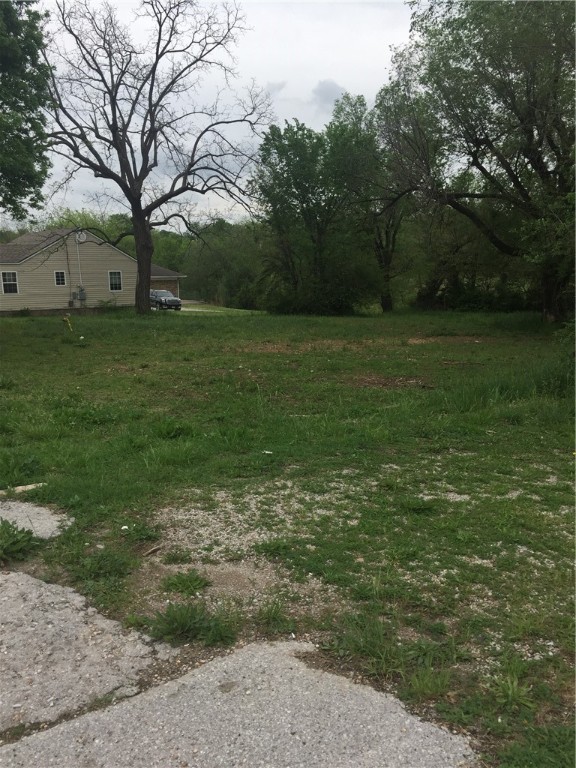 old garage on property needs torn down. has all utilities onsite.
