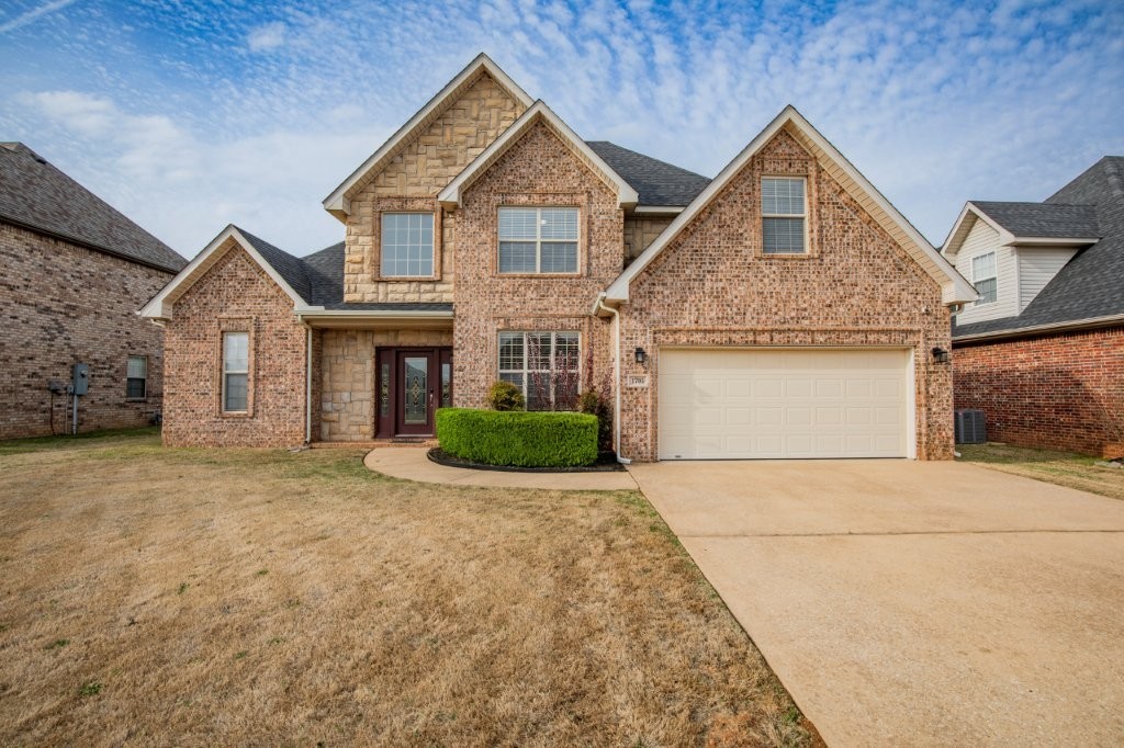 Charming Home in an Excellent Location! Located in an established neighborhood with easy access to I-49, this beautifully maintained home is just 15 minutes from the new Walmart Campus and close to schools, shopping, and entertainment. Features You'll Love: Freshly painted interior with new hardwood floors upstairs. Limited carpet for easy maintenance. Big primary bedroom with a spacious closet. Formal dining room, breakfast nook, living room – perfect for entertaining. Lots of natural light with large windows throughout. Roof only 3 years old! LED outdoor lighting. Refrigerator included! Big pantry & plenty of cabinets. New smoke alarms installed. This home offers comfort, convenience, and plenty of space. Don't miss out—schedule your showing today!