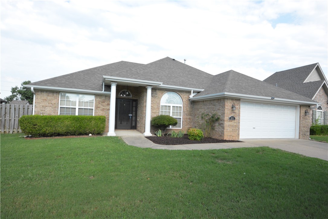 Enjoy this wonderful 1 story brick home in West Fayetteville . Very nice covered front entry featuring two large columns & Mahogany stained wood door & side panels . Three large bedrooms with primary suite on one side and the other two bedrooms on the other side. The interior also features mostly engineered wood flooring through-out, no carpeting . Formal dining area . Enjoy having a big back-yard with no houses directly behind you . 10 x 12 storage shed conveys with house . Homes is just minutes to Holt Middle & Holcomb Elementary Schools. 6.4 miles to Haas Hall Academy & 6.1 miles to Fayetteville High School !