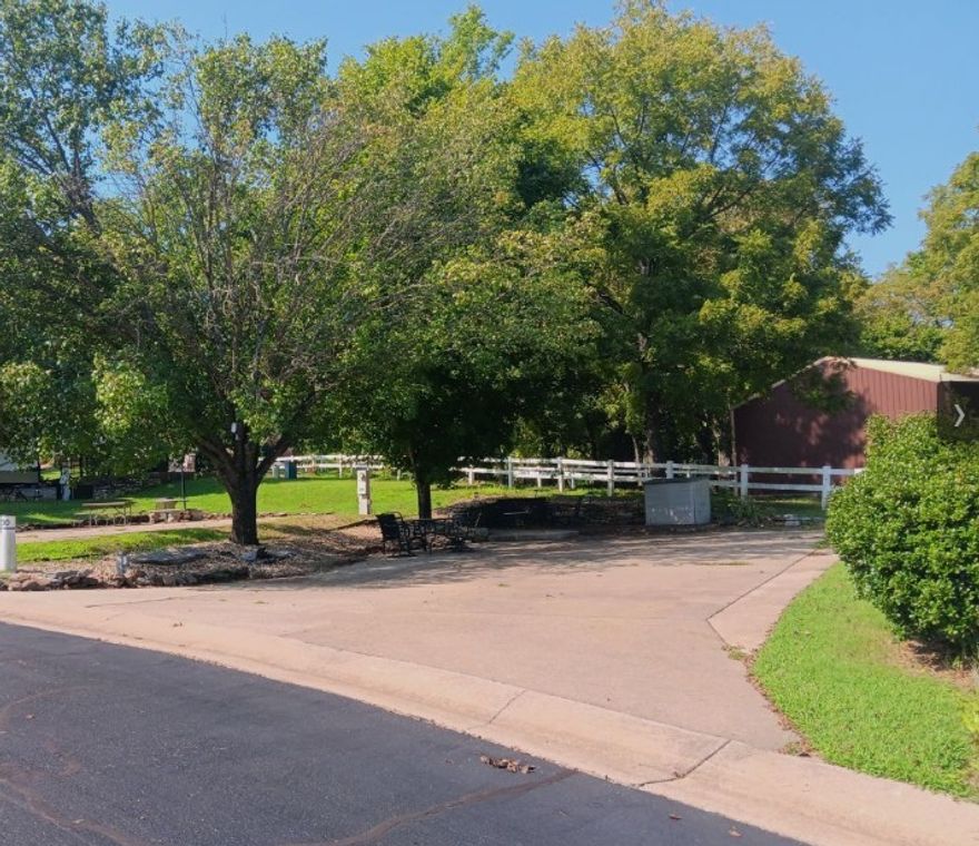 Luxury will be yours at the Ozark RV Resort! This perfectly shaded lot will have the Full time RV'er falling in love with the opportunity to own their very own piece of this hidden Ozark paradise. All sites at the Resort offer full hook ups and Owners have access to all amenities including Over Night security, 2 pools, a club house, fitness center and any time lake access. Roam the paved roads of this gorgeous Resort by golf cart and gather with your Resort family for some Fall time festivities and Cook outs. Not using it all season? We'll miss seeing you, but If this will be your second home or a getaway ..Ask about the rental pool. Furnishings Convey- Witness some of the most amazing sunsets ever seen happen at Table Rock Lake