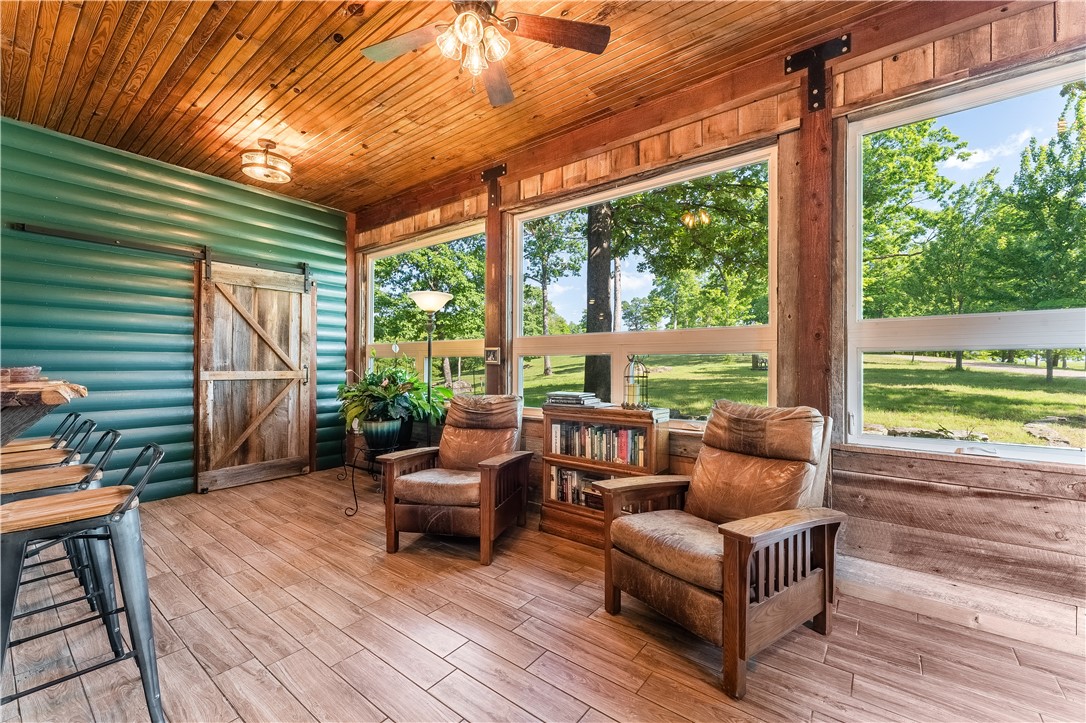 Outdoor lovers dream! Welcome to your secluded cabin at the end of a private road. This beautiful 15 acres is the perfect fit for those that want to enjoy nature & the peace & quiet that comes with it. Cabin features lots of natural light, a very spacious, open concept in living/kitchen area & numerous upgrades. Large laundry/pantry with extra storage. New Samsung appliances, imported beams, maple cabinets, pellet stove, 2 new Trane HVAC units, new water heater, Generac generator for backup power to home & pool house. 1 bed & bath downstairs, 1 bed & bath upstairs with walk out deck. Pool house is 1 bed & bath with large deck around above ground pool. Stocked pond next to the house and lots of trails and space to explore outside. The views are simply awesome & the wildlife is plentiful. A park-like setting is the best way to describe it. Just a few min from Lake Fort Smith for access to even more trails and fishing. Situated perfectly between Fayetteville & Ft Smith, & less than 10 min from I-49. Great opportunity!