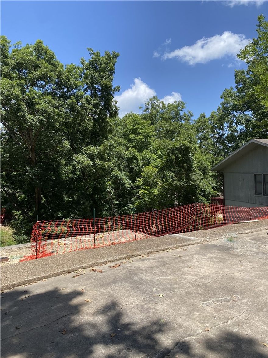 Two townhome lots are a rare find in Bella Vista.  Builder/Investor will find big saving when comparing the cost of construction to single family homes in this area. No trees to clean or septic system to install. No new water service to pay for. Brokered owned.