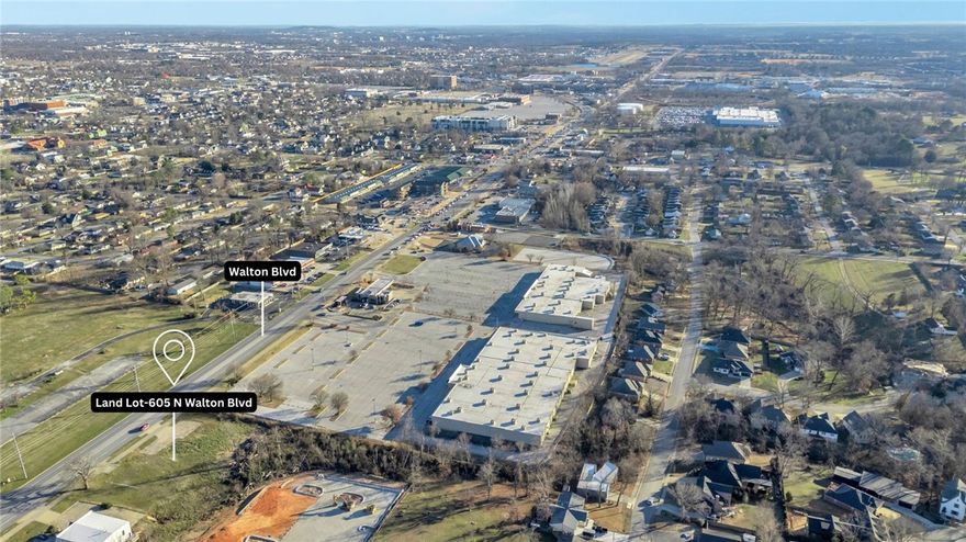 Prime Walton Blvd (Hwy 71B) Bentonville opportunity—two parcels totaling approx. 0.57 acres being sold together only to create a deeper footprint in a high-visibility corridor. The front parcel # 01-00878-000  (approx. 0.33 acres) offers Walton Blvd exposure, while the rear parcel # 01-00888-000 (approx. 0.24 acres) sits directly behind it (no street frontage) and adds valuable extra space for future development, parking, storage, or layout flexibility (subject to city approval/zoning). A structure previously existed on site, so utilities have historically served the property (buyer to verify availability/capacity and any tap/connection fees). Convenient to major employers, established commercial/retail, and the nearby trail system—an excellent location for your next project.