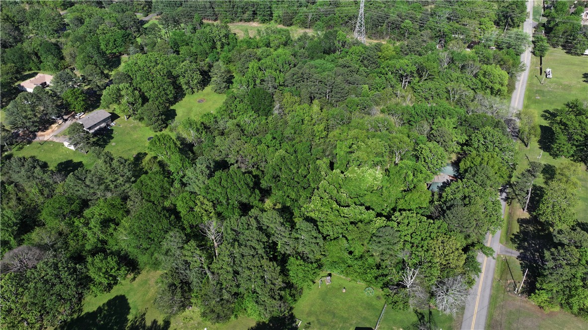 Prime development opportunity in one of Russellville’s most desirable areas! This beautiful 10-acre tract on River View Road offers a rare chance to build your vision in a sought-after location. With an easement already in place through Hillcrest Subdivision, this property is a perfect candidate for a brand-new subdivision or a private estate. The land offers a mix of mature trees and open areas, providing flexibility for multiple home sites or a custom build. Just minutes from downtown Russellville, Arkansas Tech University, shopping, and dining — yet tucked away enough to offer privacy and a scenic setting. Whether you’re looking to invest, develop, or create a private retreat, this property has the space, location, and potential to make it happen!