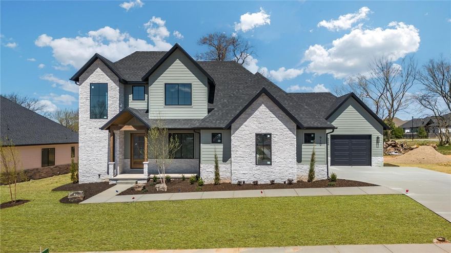 Welcome to this stunning 4-bedroom, 4-bathroom home in the desirable Big Sky Development. With 3,240 square feet across two levels, this home blends modern mountain style with functionality and elegance. The open-concept living, dining, and kitchen areas create a spacious atmosphere ideal for both family living and entertaining. The chef’s kitchen features KitchenAid appliances, sleek quartz countertops, and an expansive island. Large windows throughout bring in abundant natural light. The luxurious master suite offers a spa-like bathroom with a soaking tub, walk-in shower with both rain and traditional shower heads, and dual vanities. Additionally, the home includes a private office, perfect for remote work, and a versatile bonus room that can easily be transformed into a media room, playroom, or additional living space. Don't miss the opportunity to make this home yours!