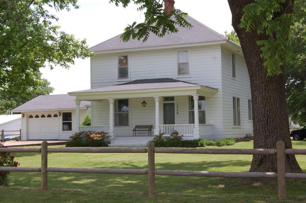 Unique and special property. This home was built in the 1890's but has been updated. This home sits on 3 acres and has a barn with two large outbuildings. There is a garden area and a small pasture. If you are looking for an out of town feel & still be minutes from everything that NWA has to offer, this is the place!
