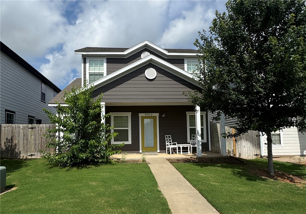 Craftsman style home located in SW Bentonville. Home features 2 levels w/ living, kitchen, master suite & half bath on main level; 2 bedrooms, full bath & laundry on upper. Hardwood floors thru out main level, granite counters, white cabinets, tiled backsplash, ss appliance (fridge included), pantry, tiled w/i master shower, walk-in showers & keyless entry. Covered front porch, private side patio and landscaped yard. Growing area close to schools, parks, restaurants, community center and shopping.